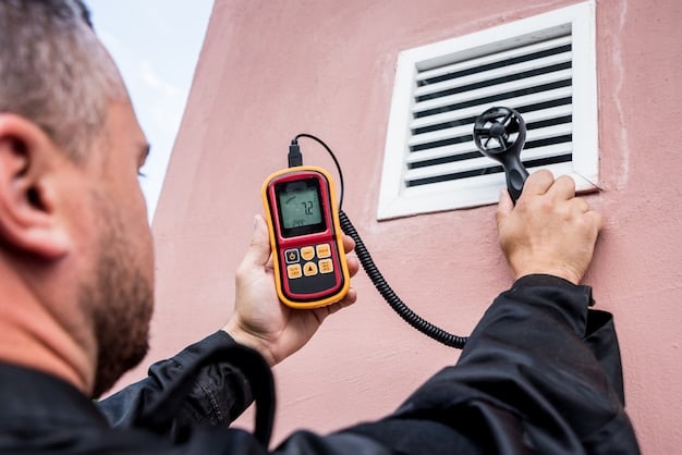 A professional energy auditor using a blower door test on a front door to measure air leakage, with gauges and equipment visible.