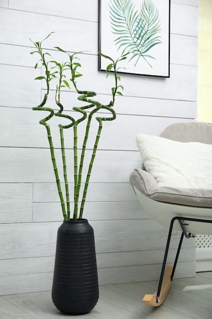 A minimalist bedroom with a platform bed, bamboo accents, and soft, natural lighting. A large potted plant sits in the corner, enhancing the room's connection to nature and promoting a sense of calm.