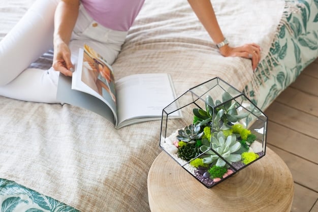 A close-up shot of a living room corner featuring a comfortable armchair with a throw blanket, a small side table with a lamp, and a potted plant, creating a cozy reading nook.